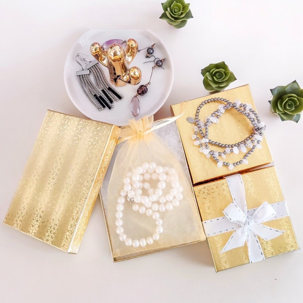 2 1/8" x 1 5/8" x 3/4" Gold Cotton Filled Paper Box